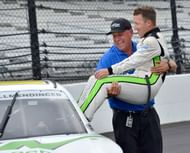 Chris Rice carries AJ Allmendinger after winning the 2022 Pennzoil 150. Source: Imagn